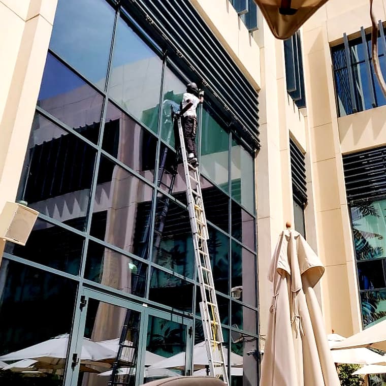 Commercial window cleaning in Dubai for restaurant and office glass facade